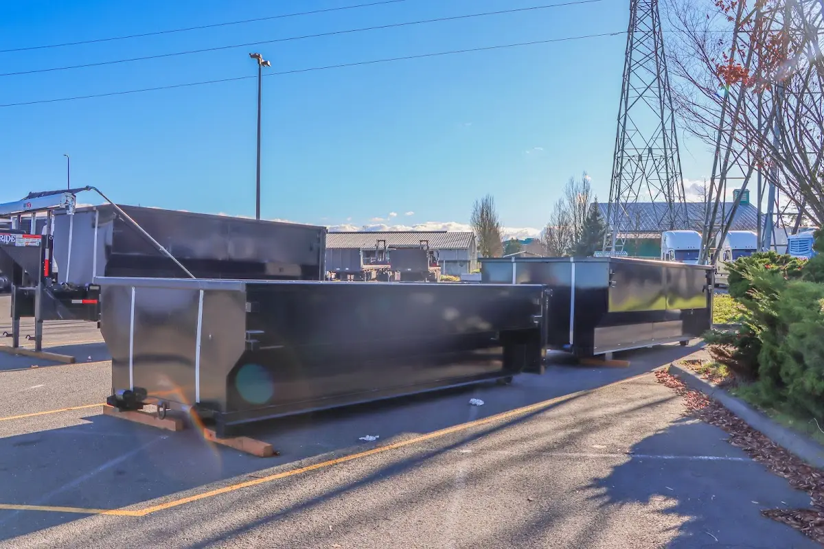 Roll-off dumpster ready for waste disposal at job site for Cleanout Dumpster Rental in Canton